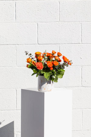 Collection of seasonal orange blooms.